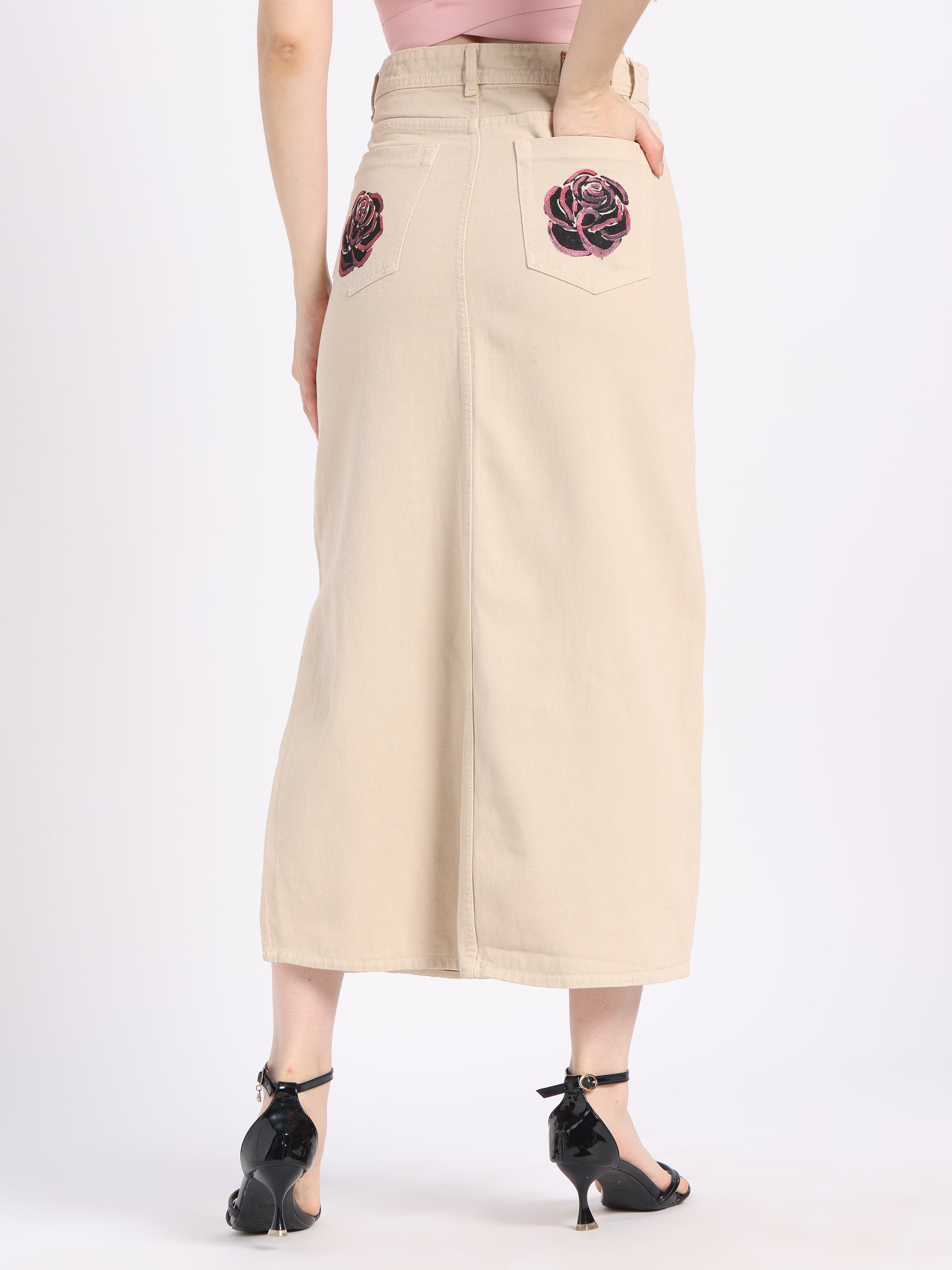 Beige midi skirt with floral pocket embroidery, perfect for Christian modest fashion styles