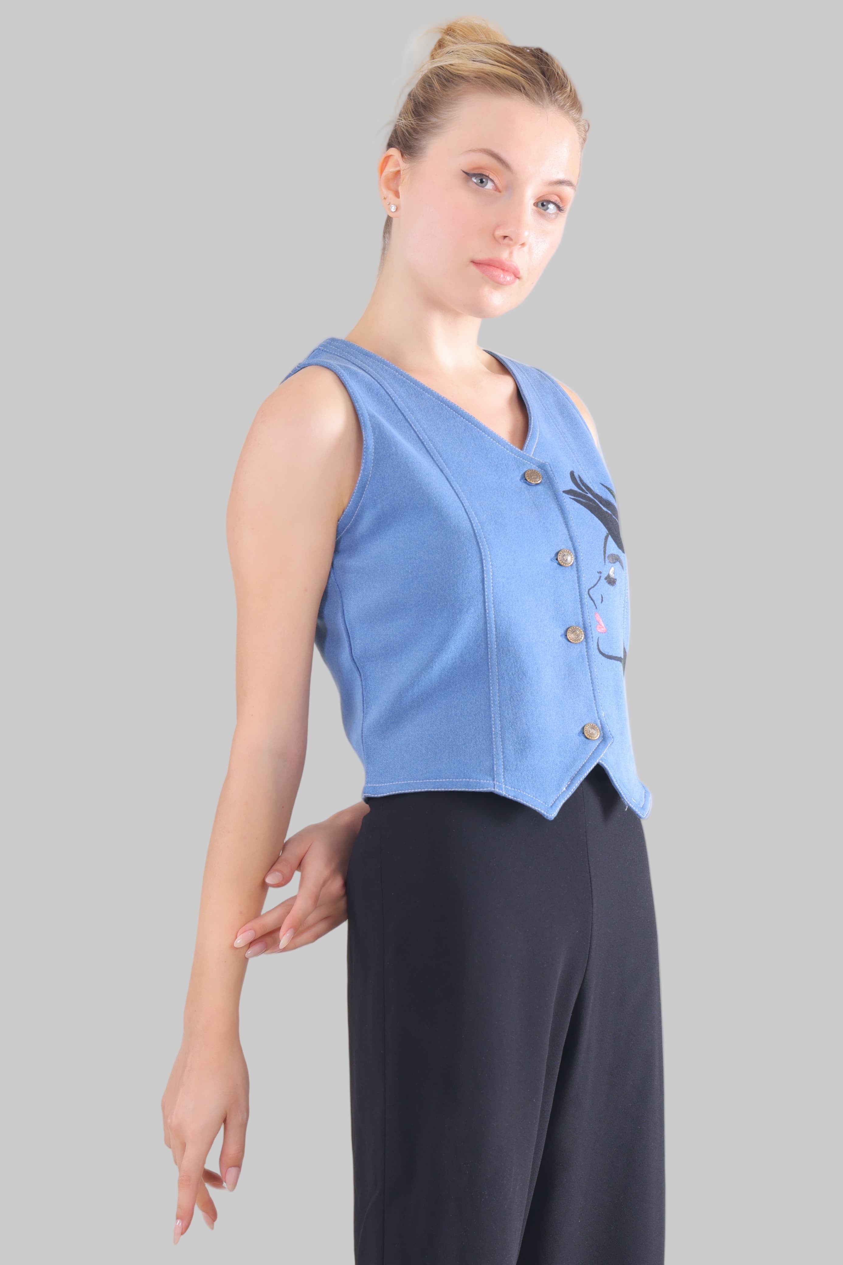 Gotamoda blue sleeveless jeans Top with button front and floral detail on model