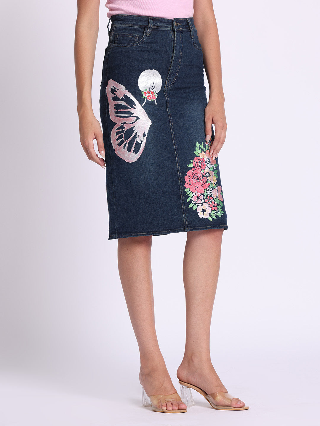 Gotamoda dark blue denim skirt with butterfly and floral embroidery worn with pink top and clear heels