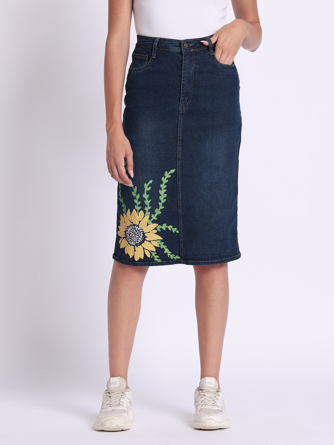 Gotamoda dark blue denim skirt with sunflower embroidery worn with white sneakers