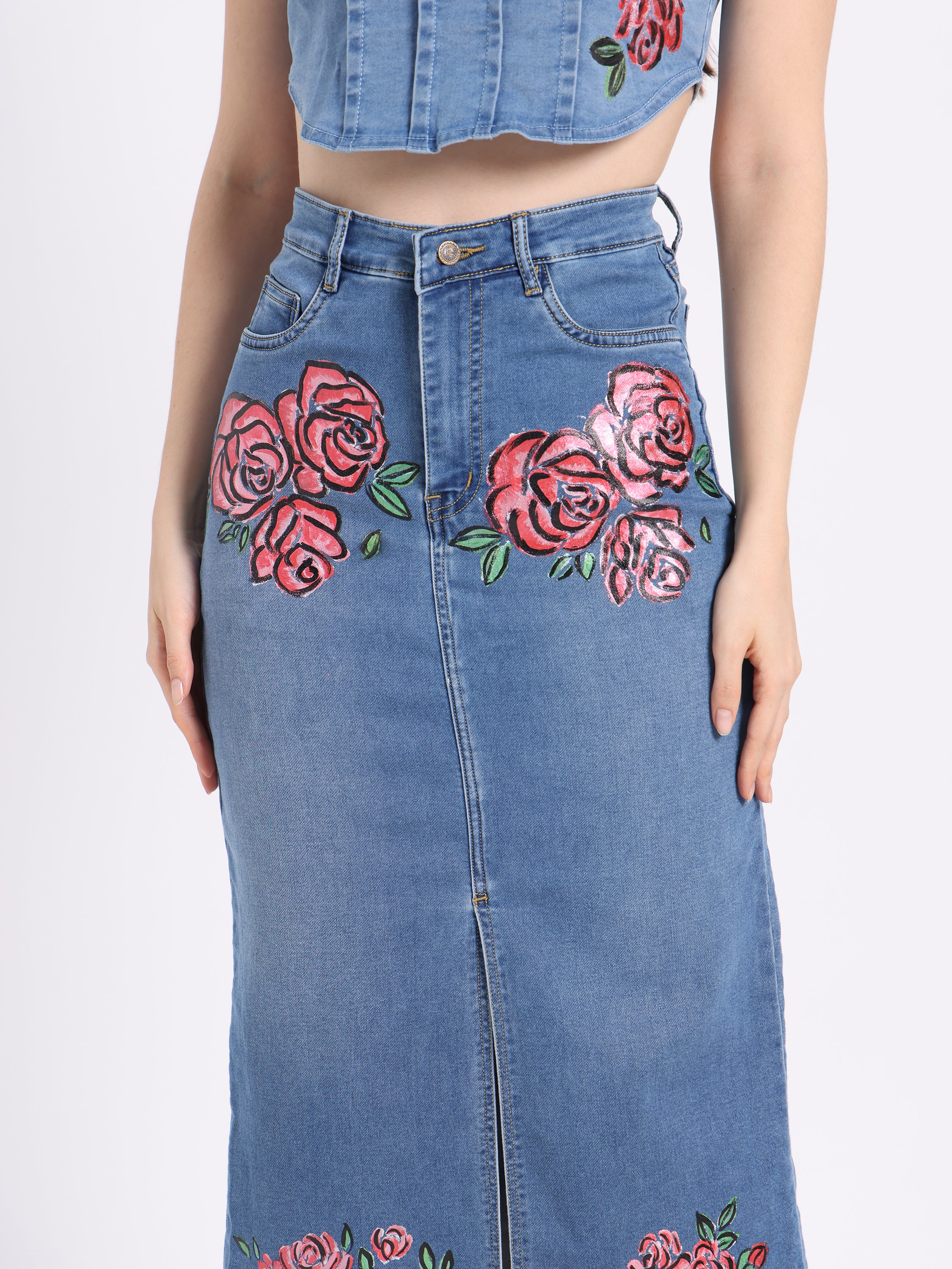 Hand-painted floral denim co-ord set featuring a cropped top and long skirt with vibrant rose designs