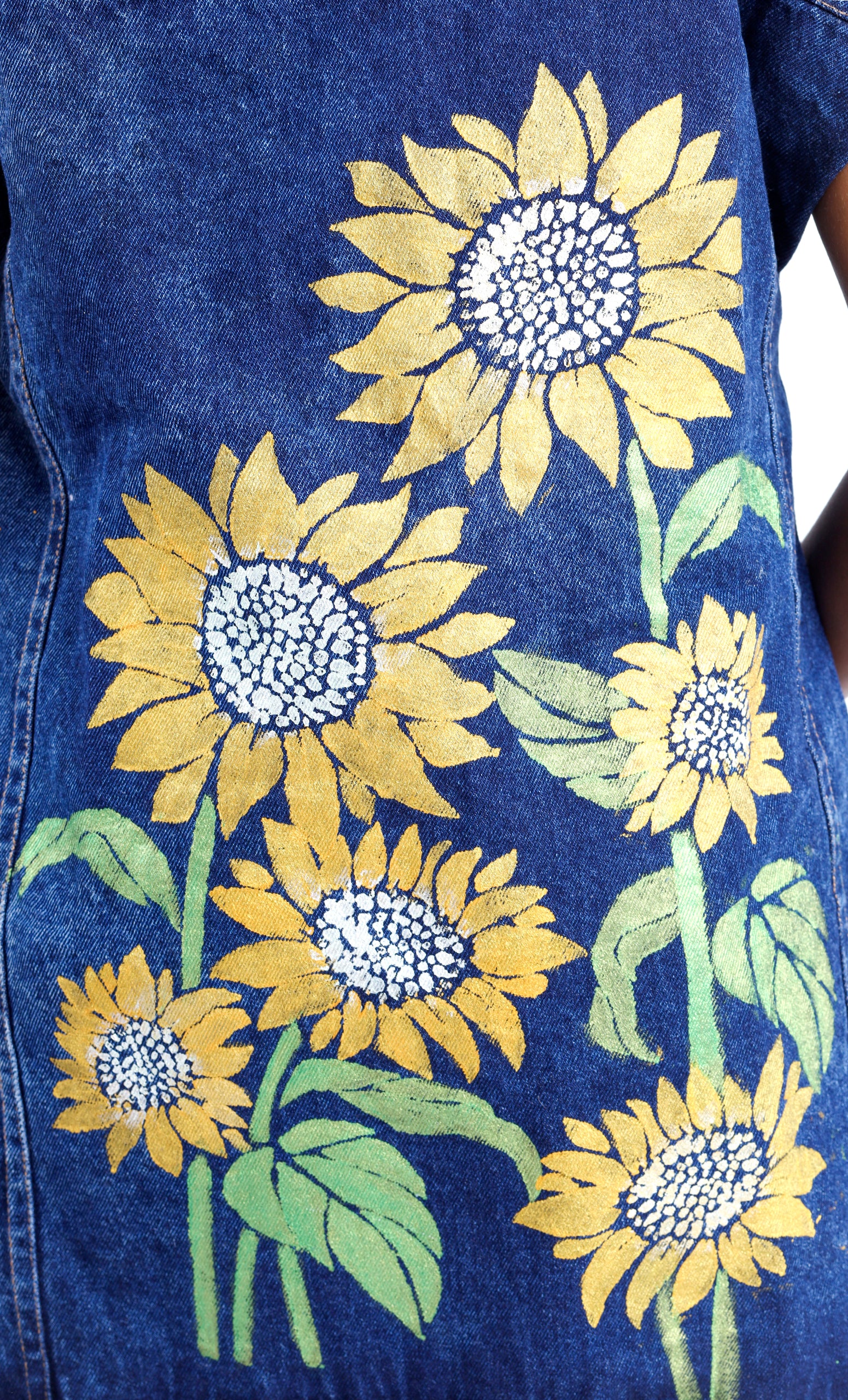 Gotamoda sleeveless denim jacket with bright yellow sunflower print and green leaves on blue fabric