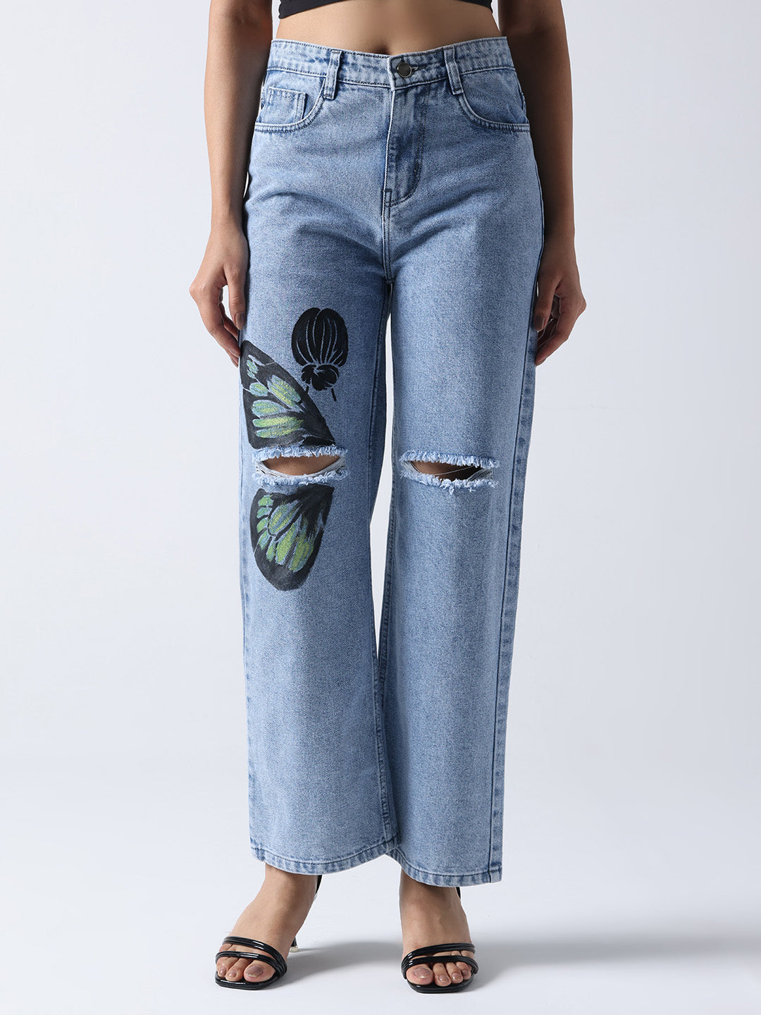 Gotamoda light blue hand painted jeans with butterfly design and ripped details on front