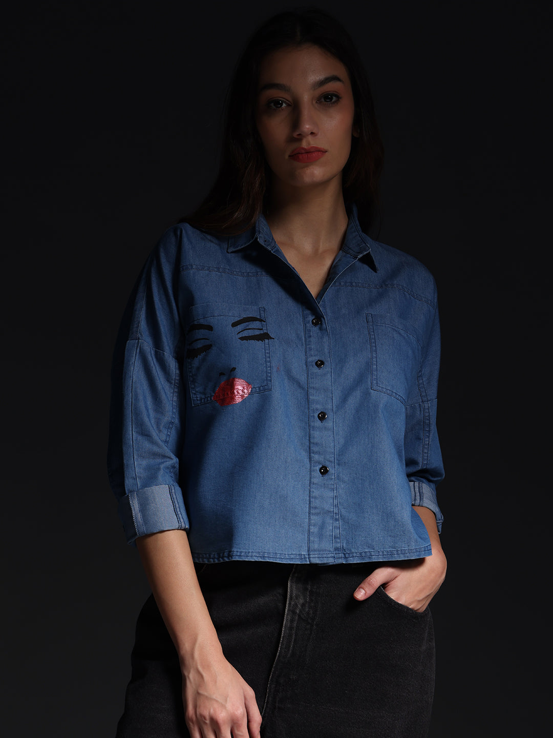 Gotamoda top jeans shirt with button-down front and embroidered face design on denim fabric