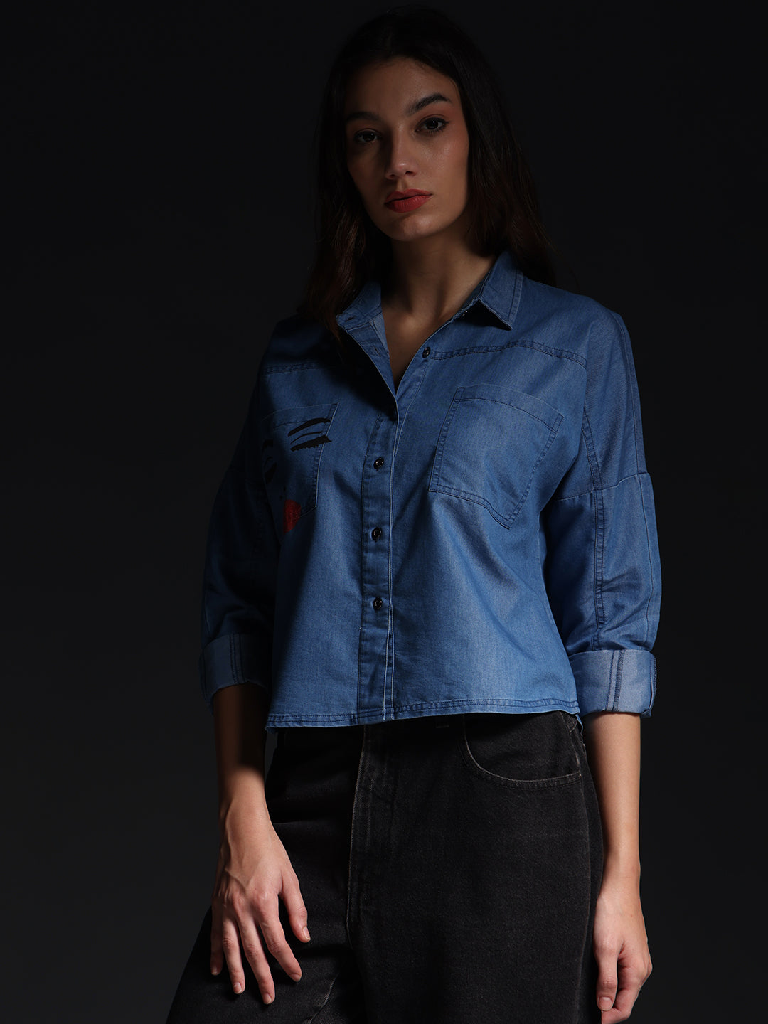 Gotamoda top jeans shirt in light blue denim worn by model with black pants