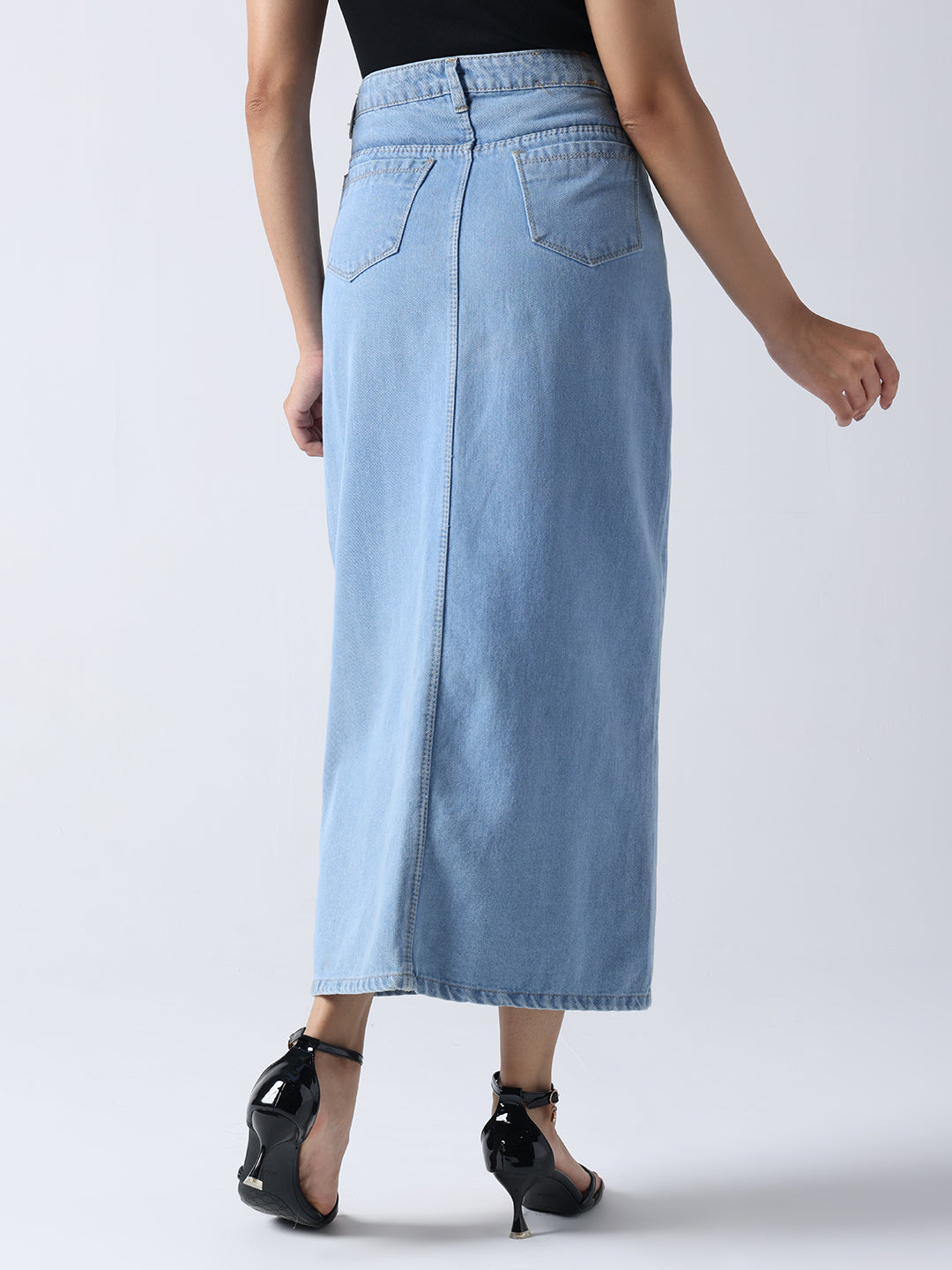 Winking Beauty Denim Hand Painted Denim Skirt in light blue worn by model with black heels