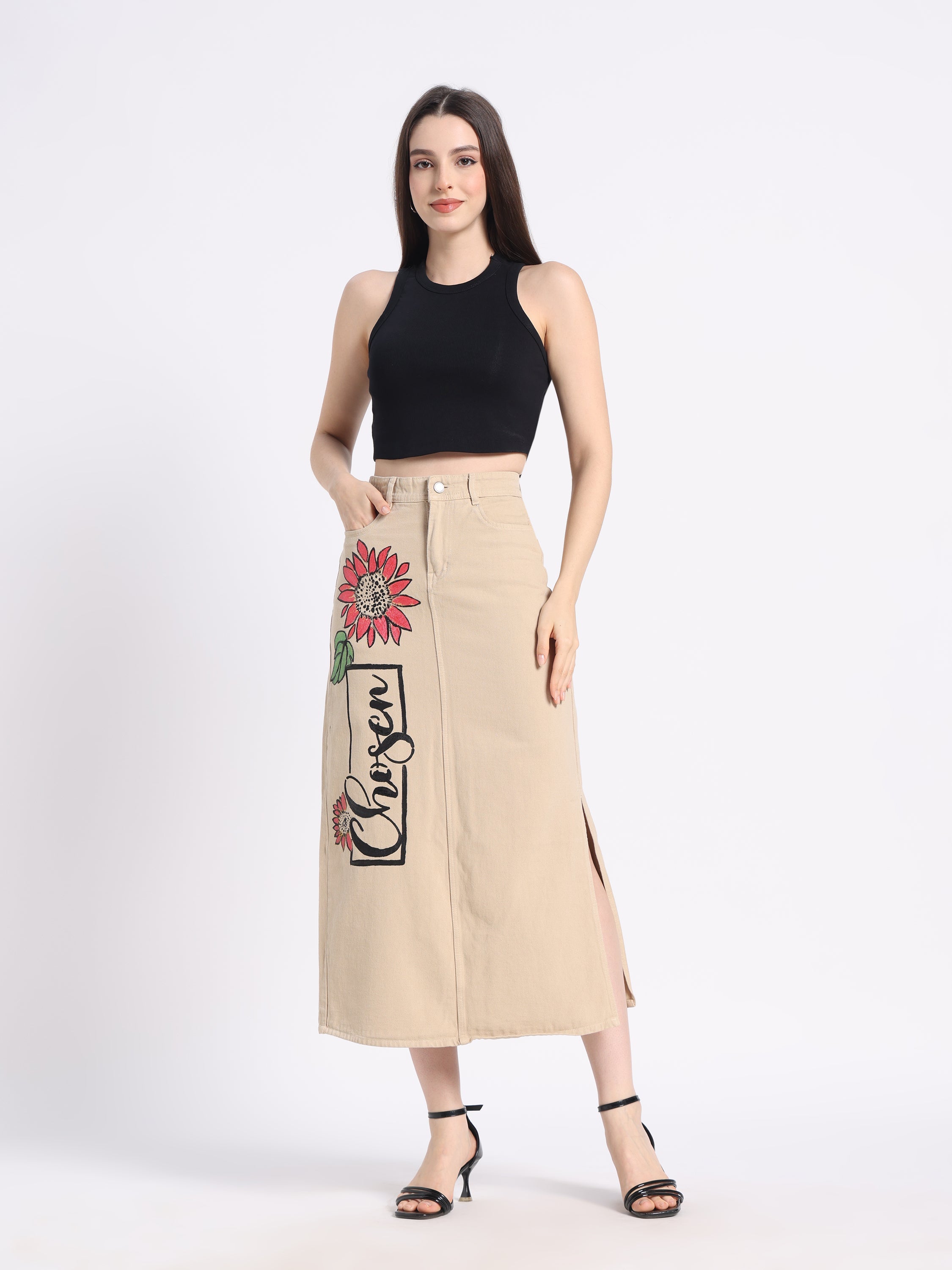 Styling a maxi denim skirt with floral design, perfect for the denim skirt length guide