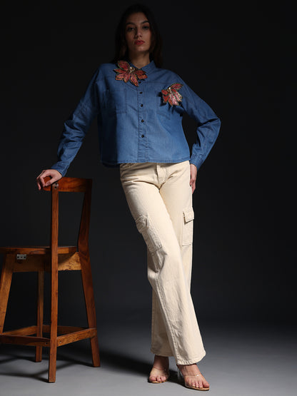 Gotamoda autumn petals shirt in blue with floral embroidery worn with beige cargo pants