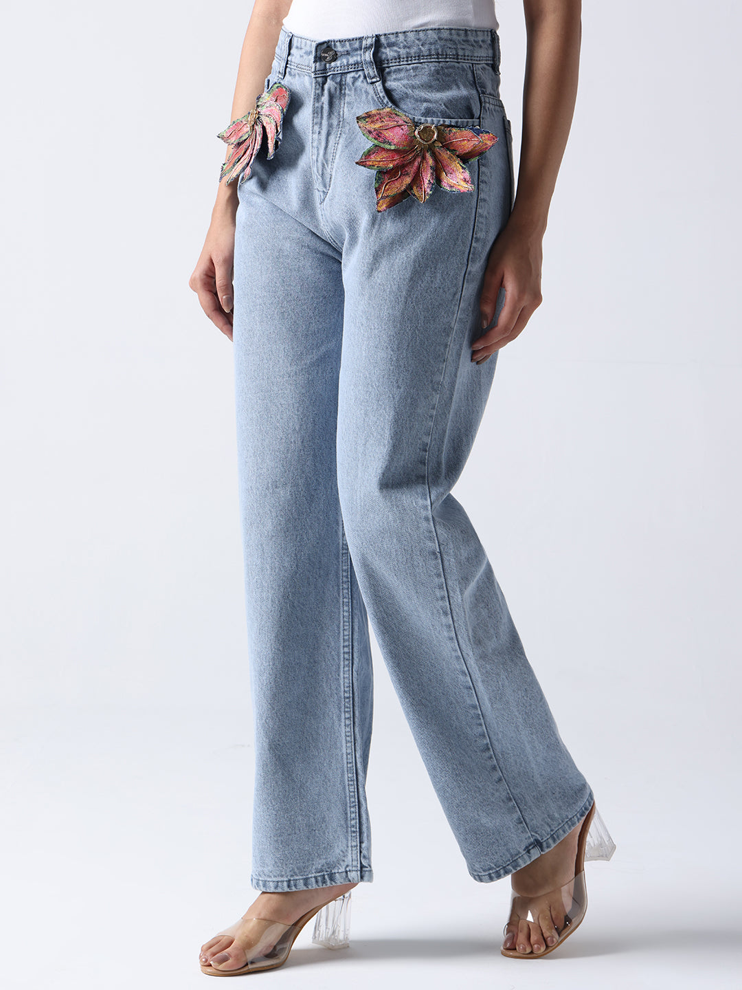 Gotamoda jeans with decorative floral brooch on jeans on front pockets in light blue denim