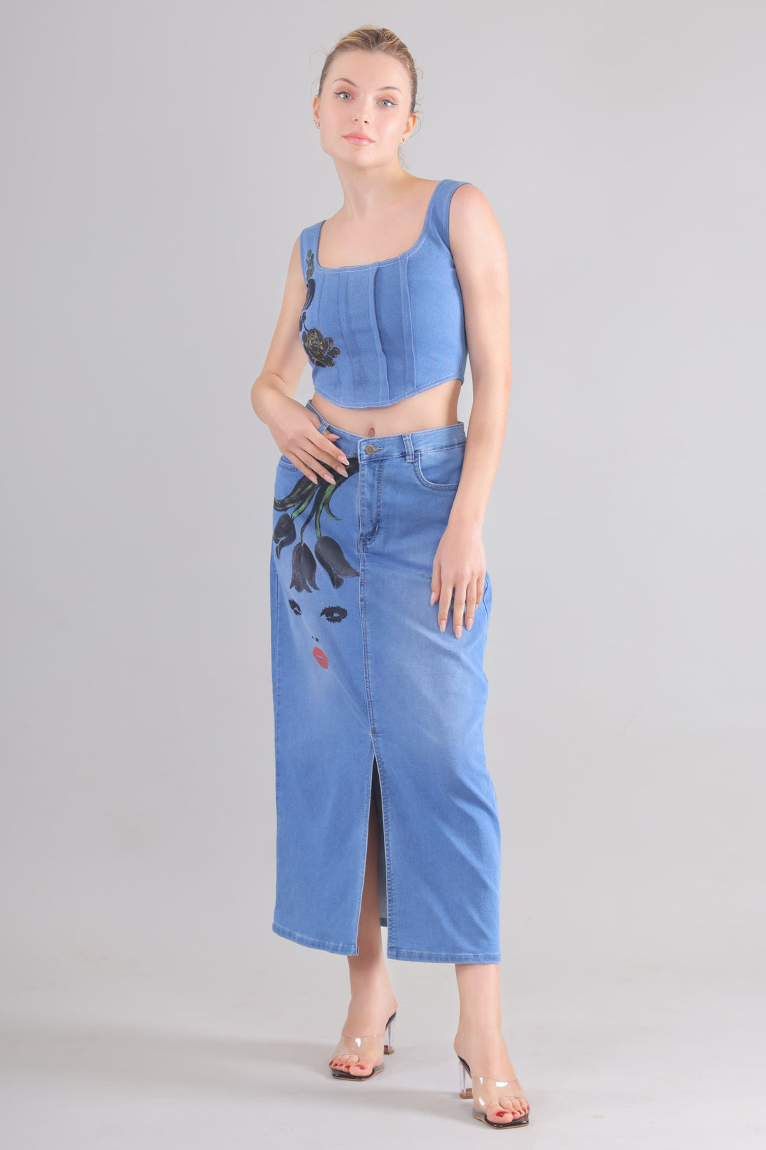 Gotamoda denim corset co-ord set featuring a sleeveless crop top and high-waisted skirt with front slit