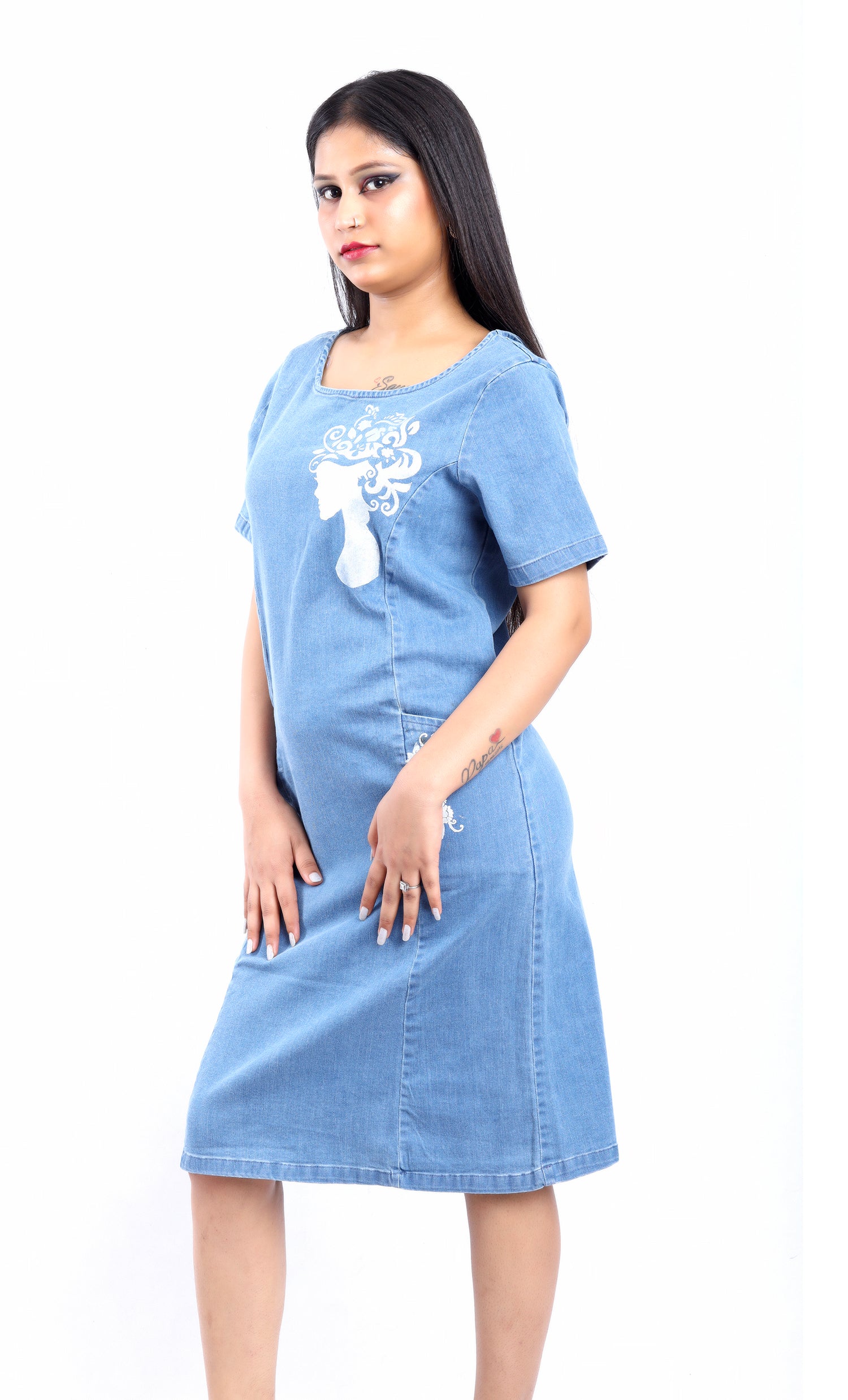 Gotamoda blue denim midi dress styled midi with jeans featuring short sleeves and white graphic print