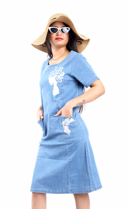 Gotamoda blue denim midi dress with floral embroidery worn as midi with jeans style