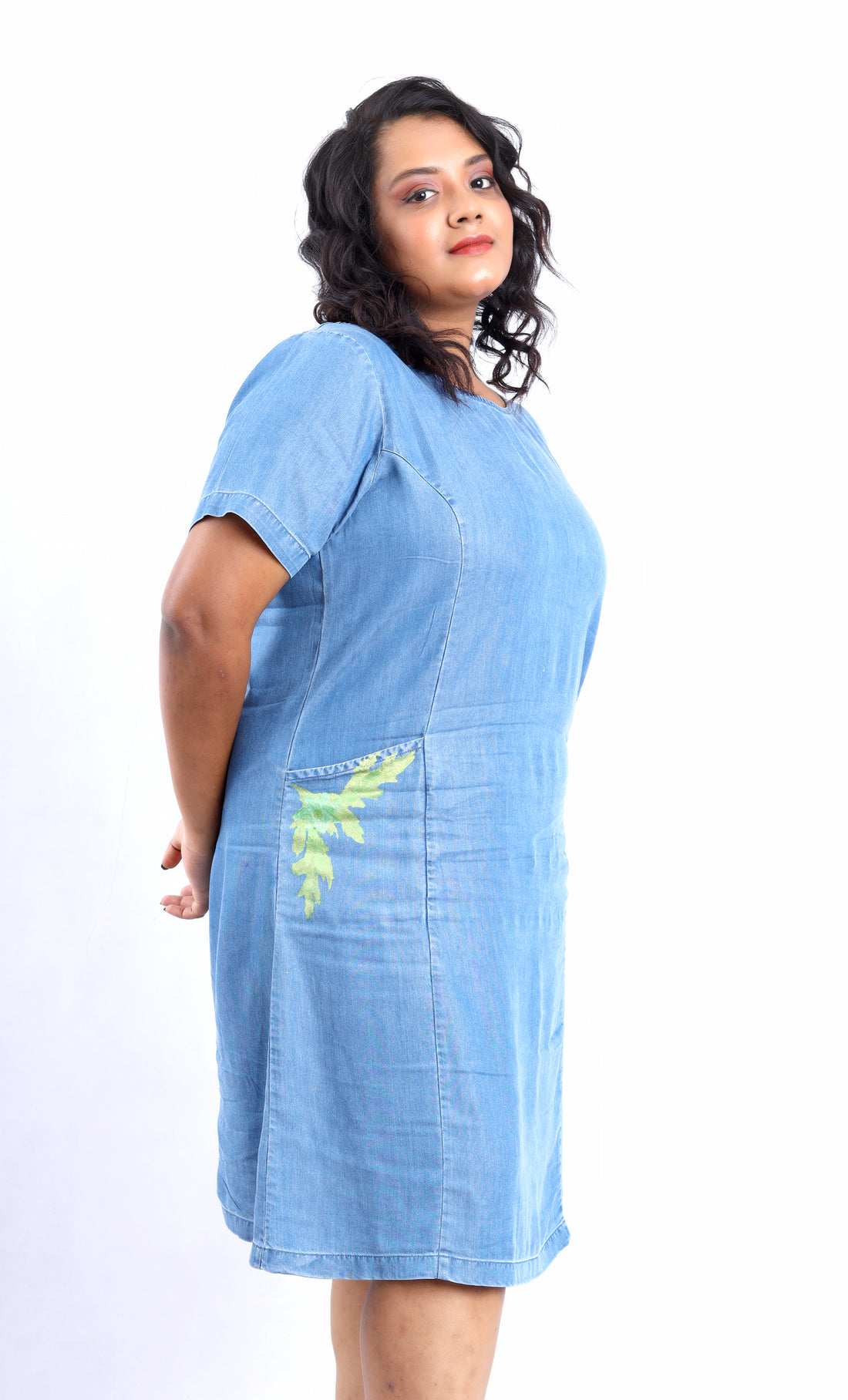 Gotamoda denim midi dress with embroidered pocket detail styled as midi with jeans outfit