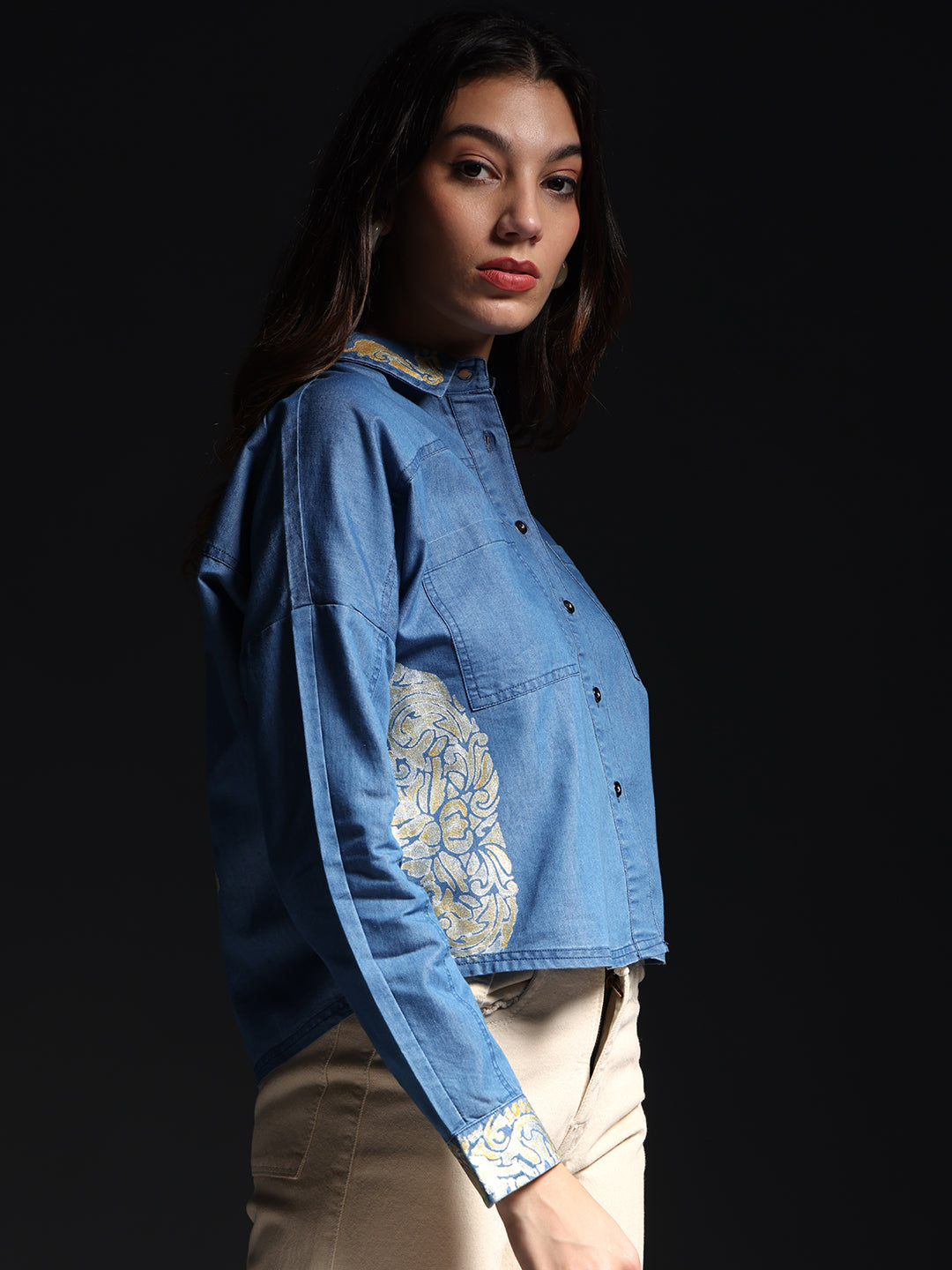 Gotamoda denim shirt with white jeans featuring floral embroidery on the sides and cuffs