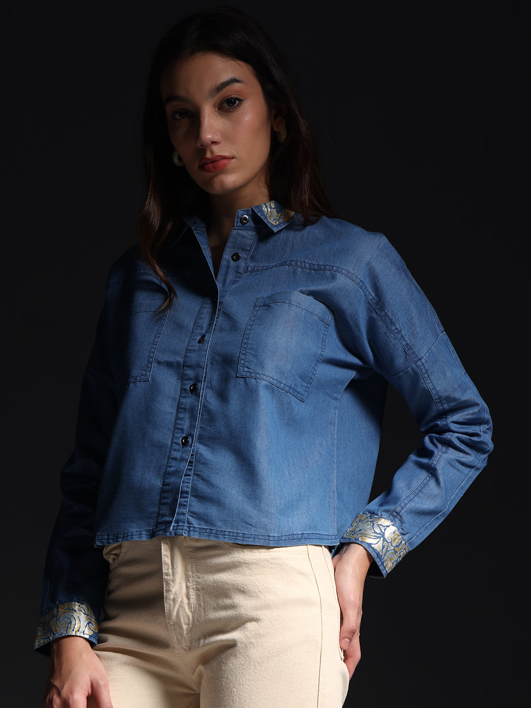 Gotamoda denim shirt with white jeans featuring detailed cuffs and front pockets