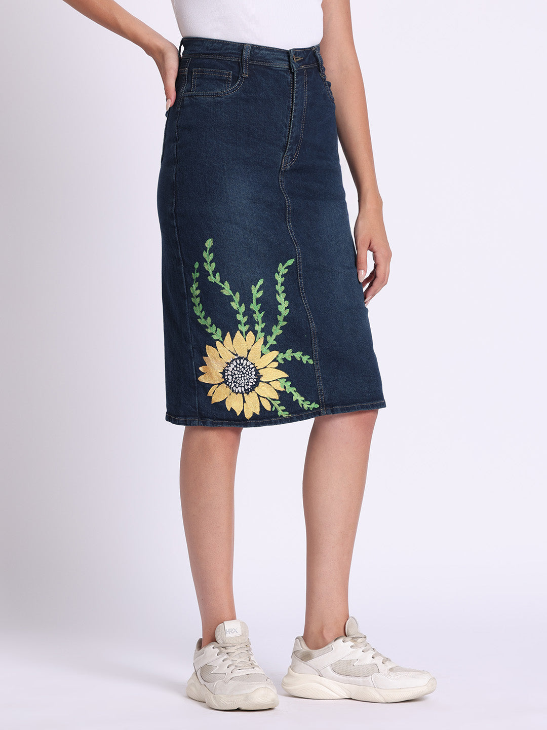 Gotamoda denim skirt with sunflower embroidery and knee-length fit styled with sneakers