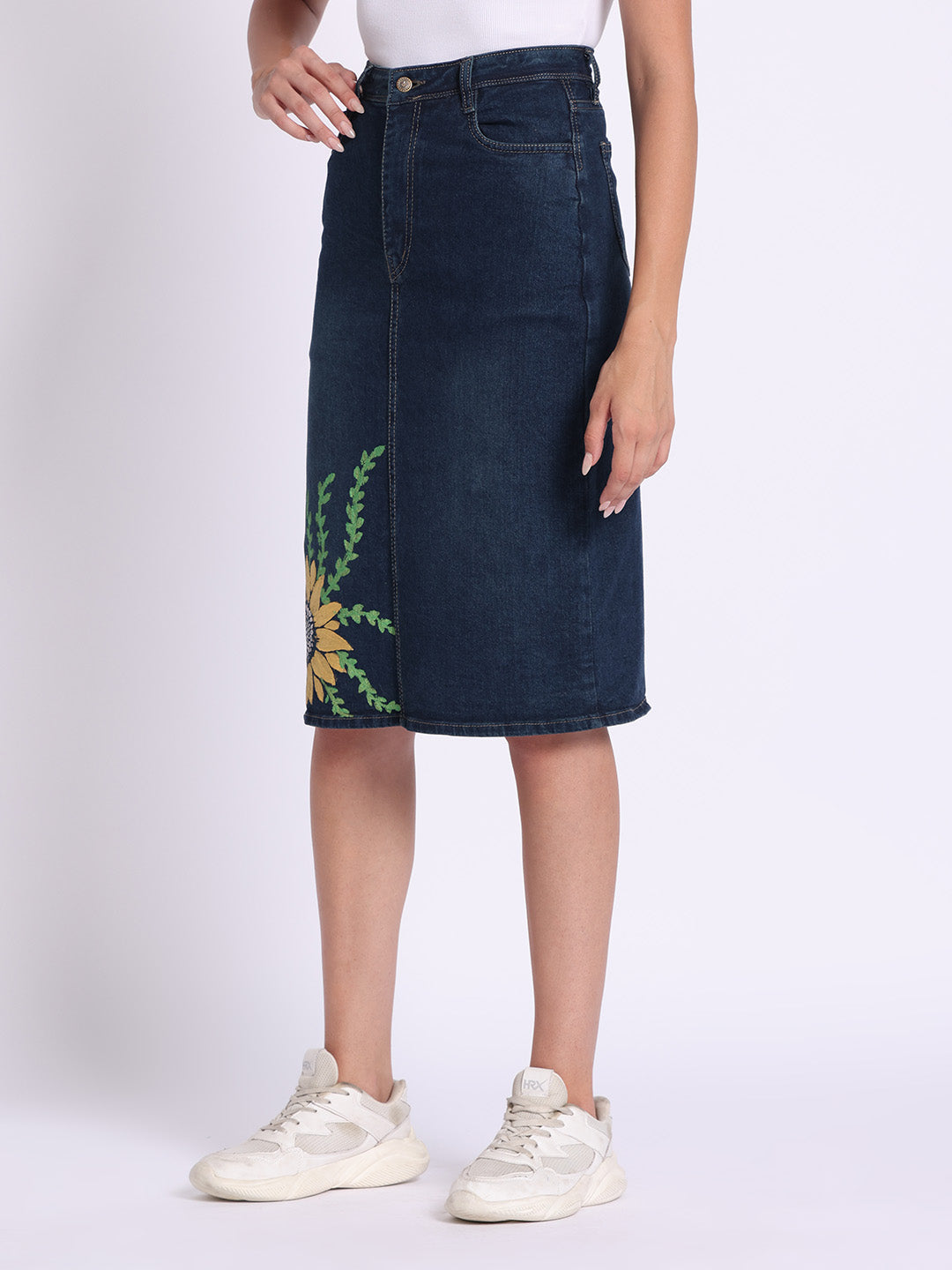 Gotamoda dark blue denim skirt with floral embroidery worn with white sneakers