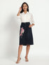 Gotamoda dark blue denim skirt with pink floral embroidery worn with white blouse and heels