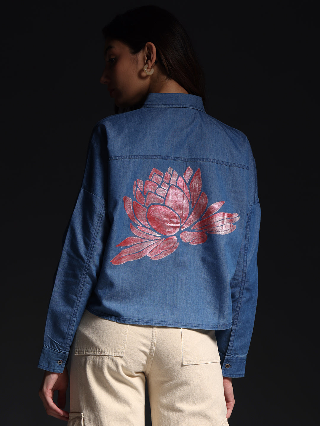 Gotamoda top jeans shirt in blue denim with pink floral design on back worn by model