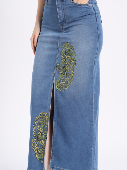 Stylish hand-painted denim co-ord set featuring a skirt with intricate embroidered designs