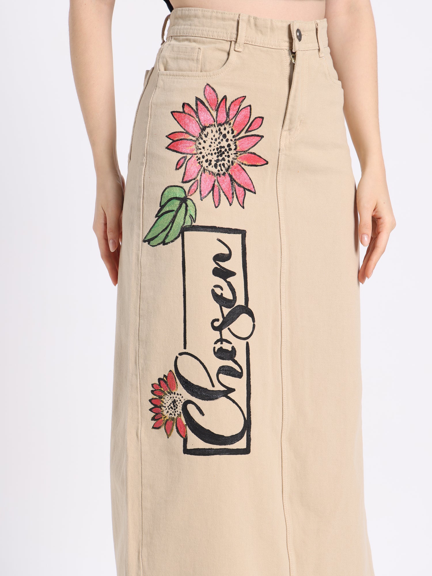 Gotamoda hand-painted denim skirt featuring floral designs and a unique Chosen print