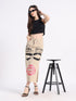 Fashionable hand-painted denim skirt featuring bold lips and eyelash designs for a trendy look