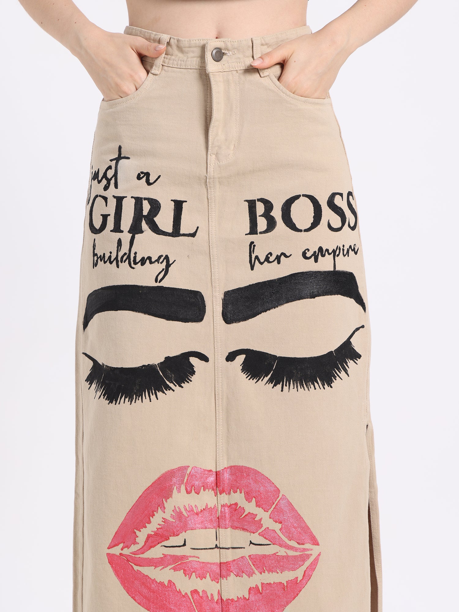 Gotamoda hand-painted denim skirt featuring bold lips and eye designs for a stylish look