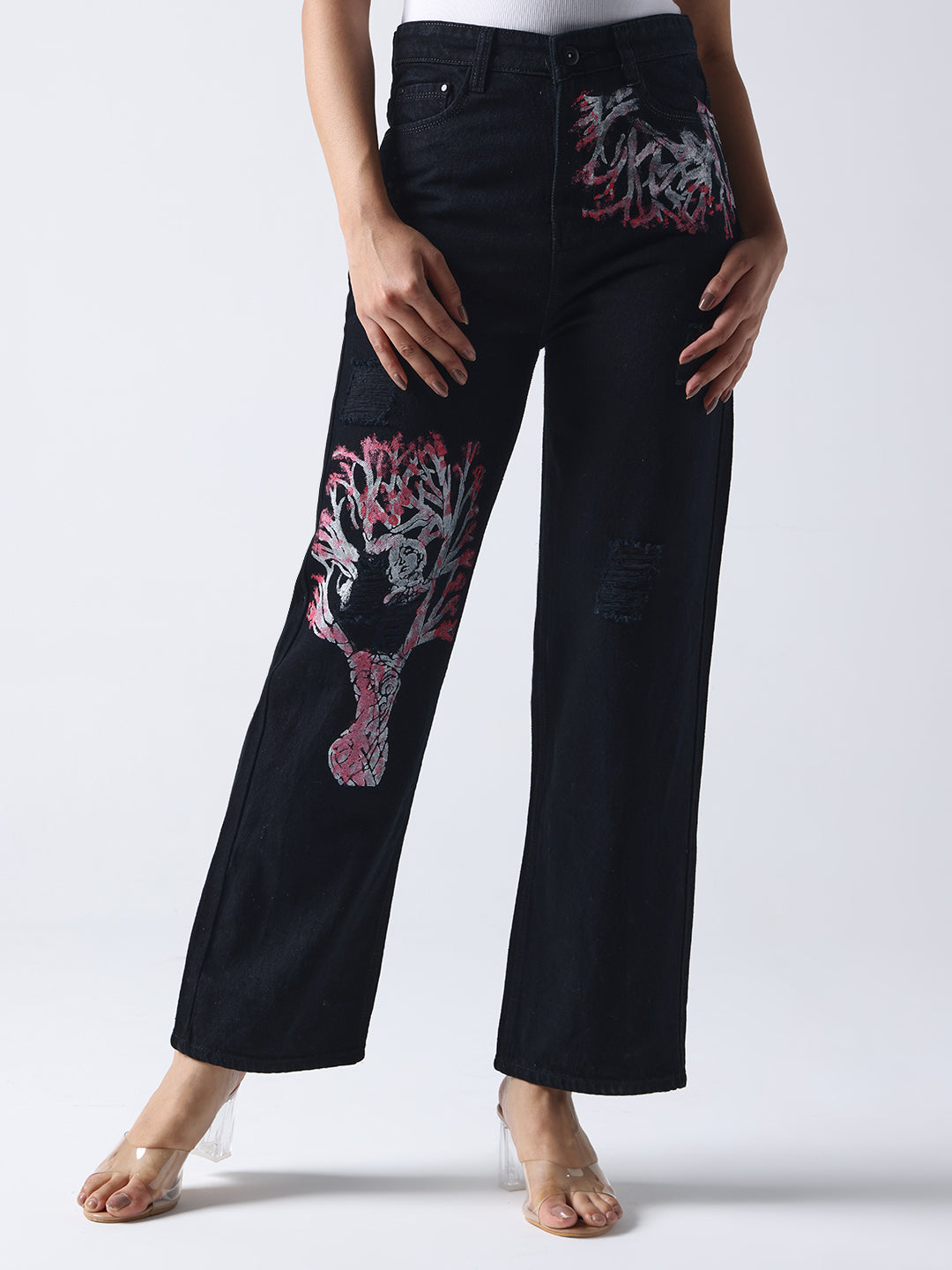 Gotamoda black hand painted jeans with pink and white artistic designs on front legs