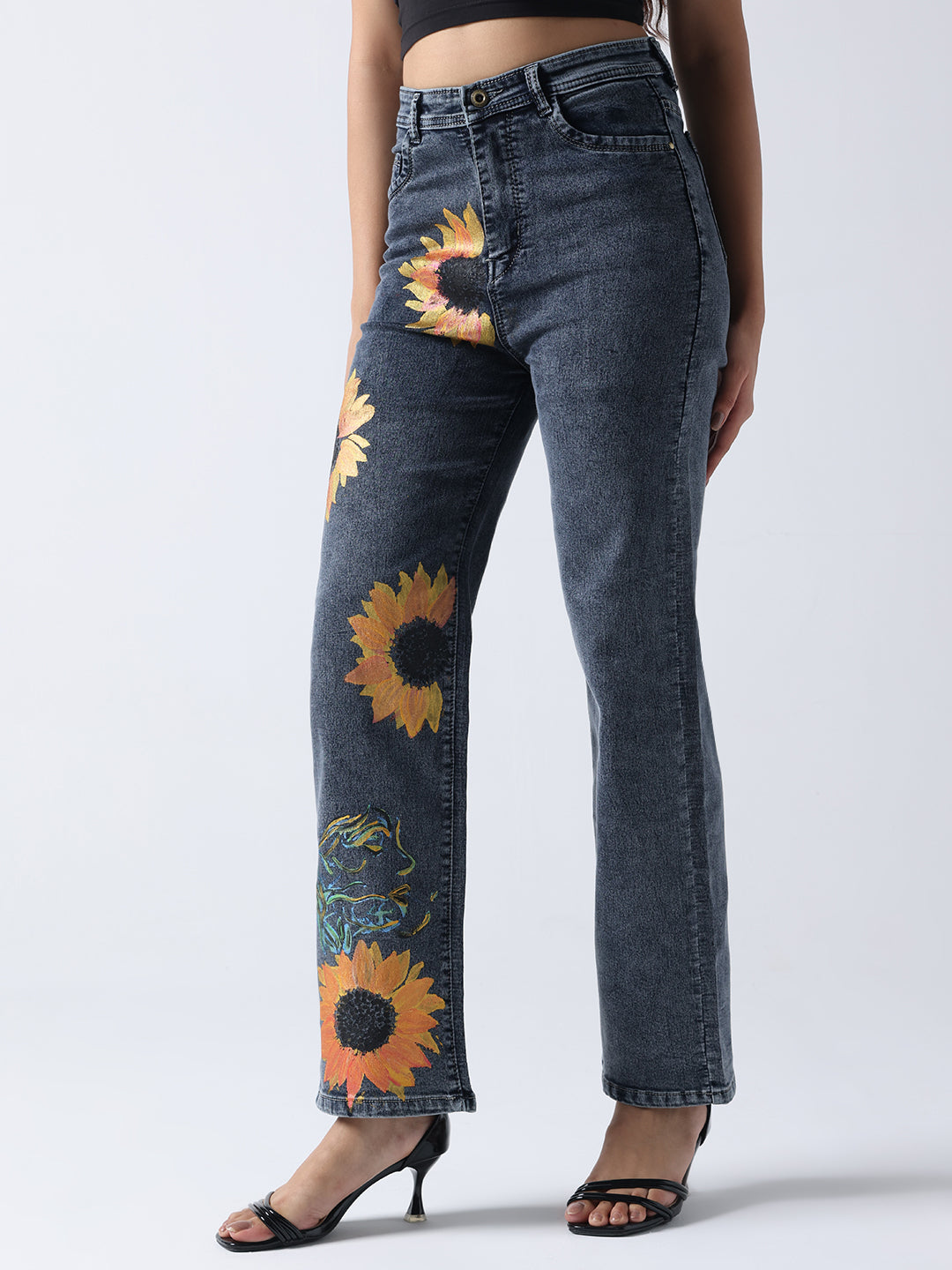 Gotamoda hand painted jeans in dark denim featuring vibrant sunflower designs on the front legs