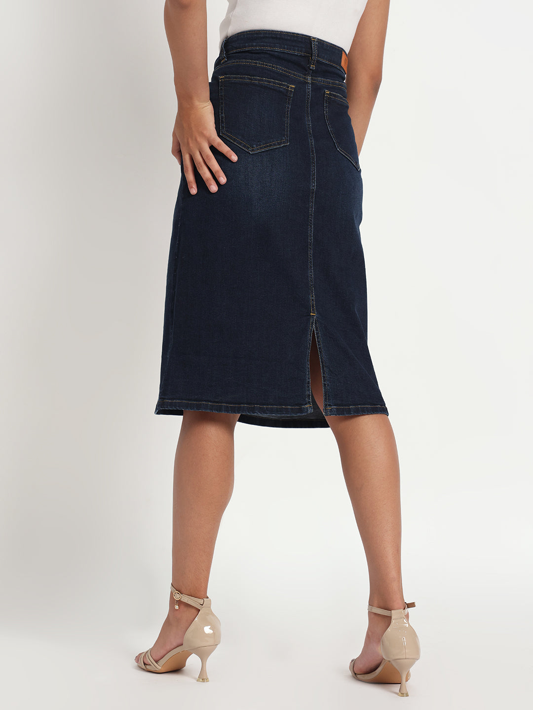 Gotamoda dark blue jeans skirt for women with back slit and pockets styled with beige heels