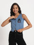 Gotamoda sleeveless blue jeans top with button front and graphic detail worn by smiling woman