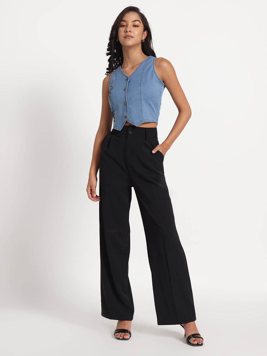 Gotamoda sleeveless blue jeans top with button front paired with black wide-leg pants