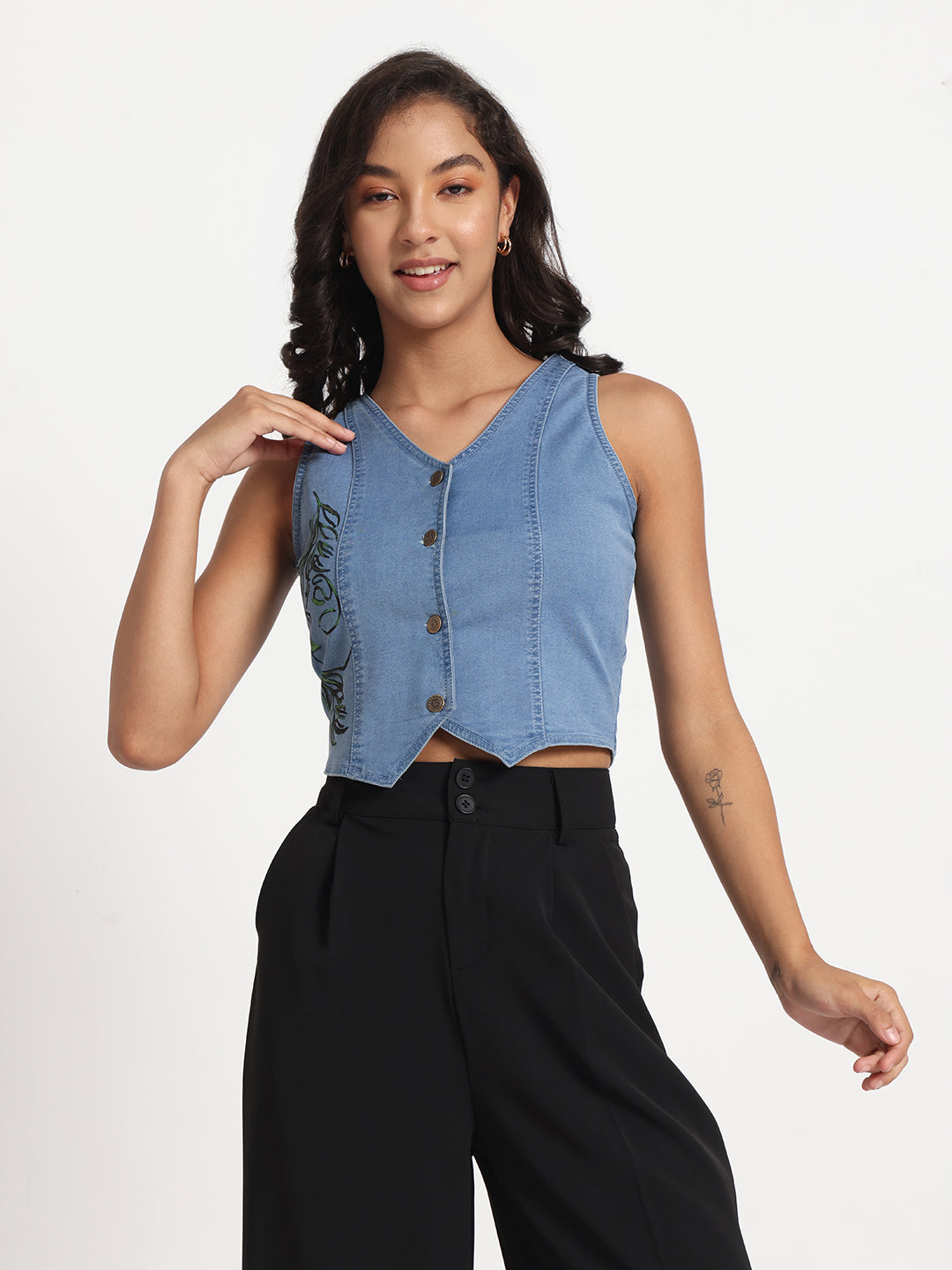 Gotamoda sleeveless blue denim jeans top with button front worn by woman