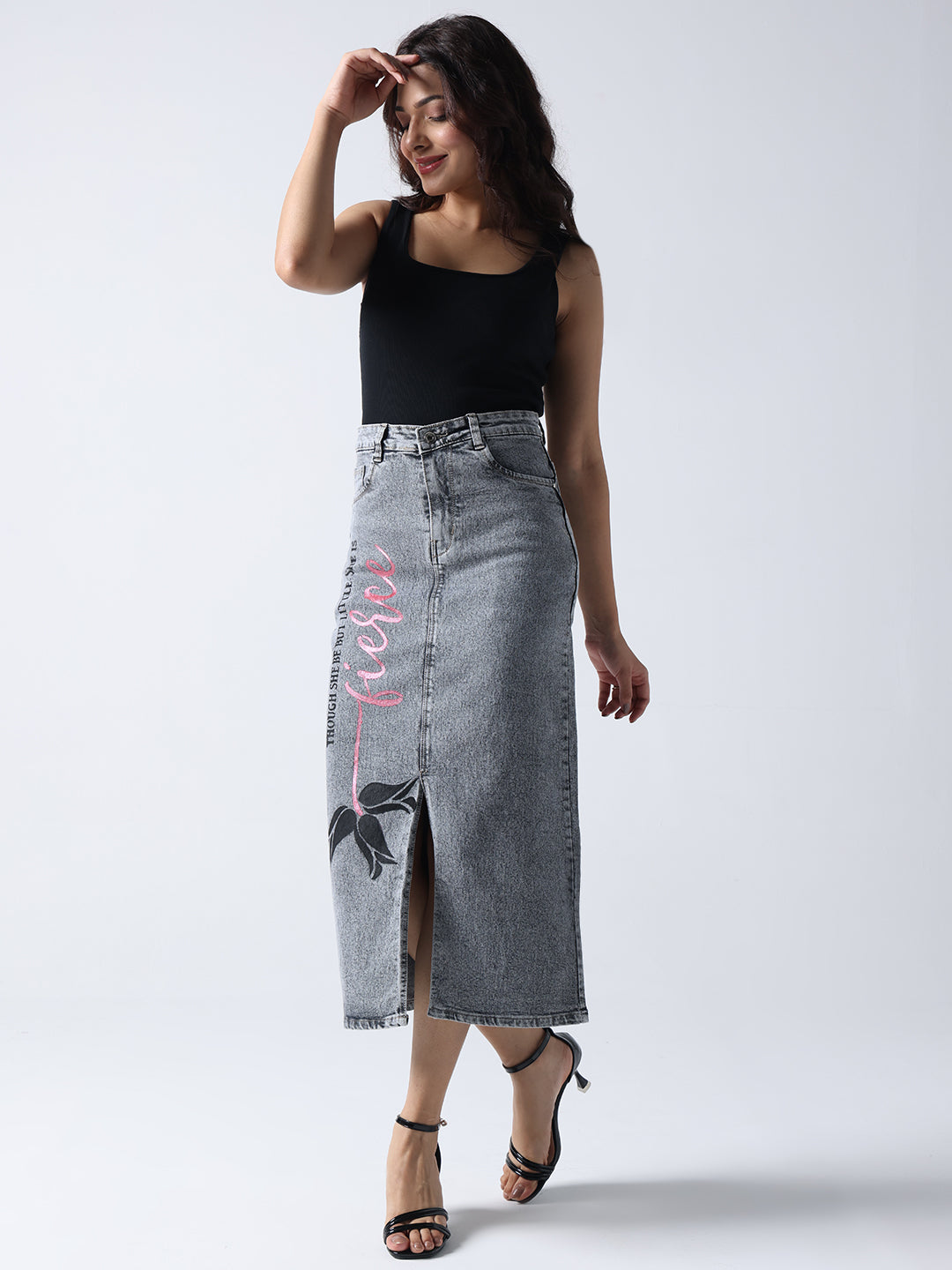 Woman wearing Gotamoda poetic rose hand Painted denim skirt with front slit and floral design