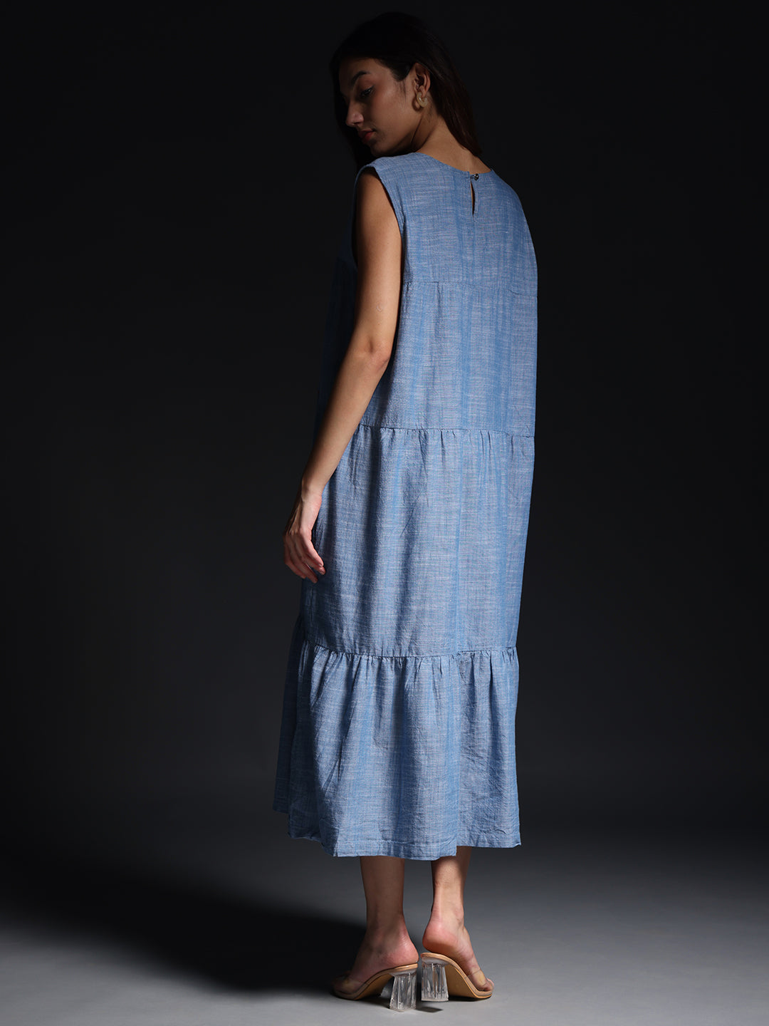 Gotamoda sleeveless maxi dress in light blue with tiered skirt and relaxed fit shown from back