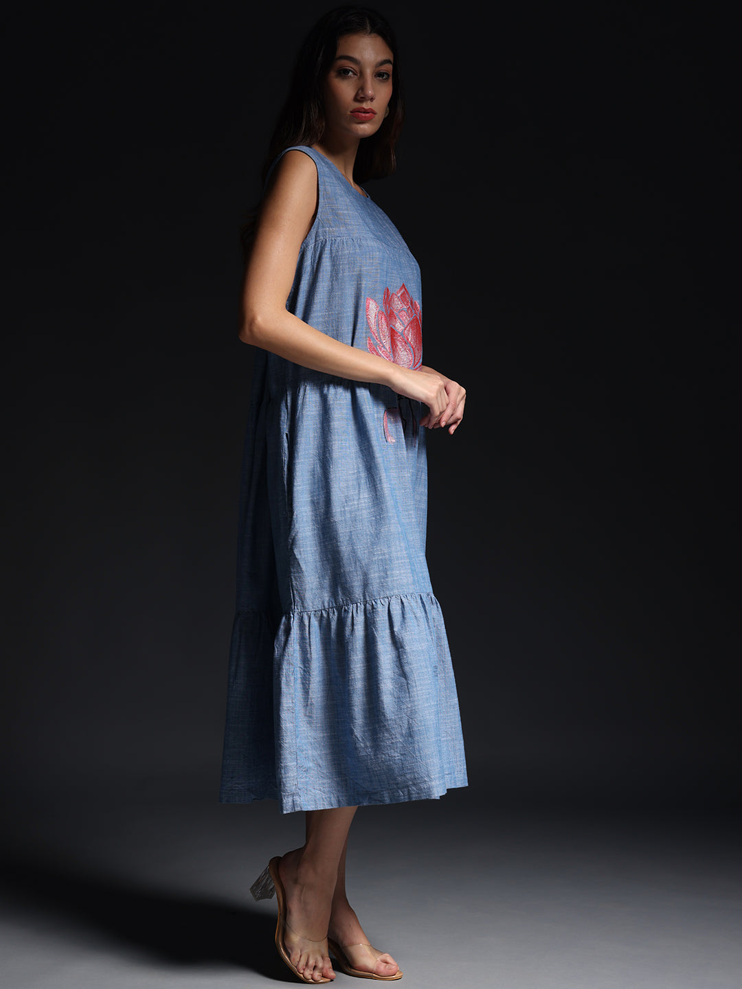 Gotamoda Sleeveless Maxi Dress in blue with floral design featuring a tiered hem and relaxed fit