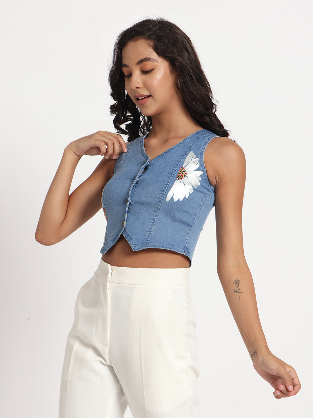 Gotamoda sleeveless blue denim top in jeans style with white floral embroidery and front buttons