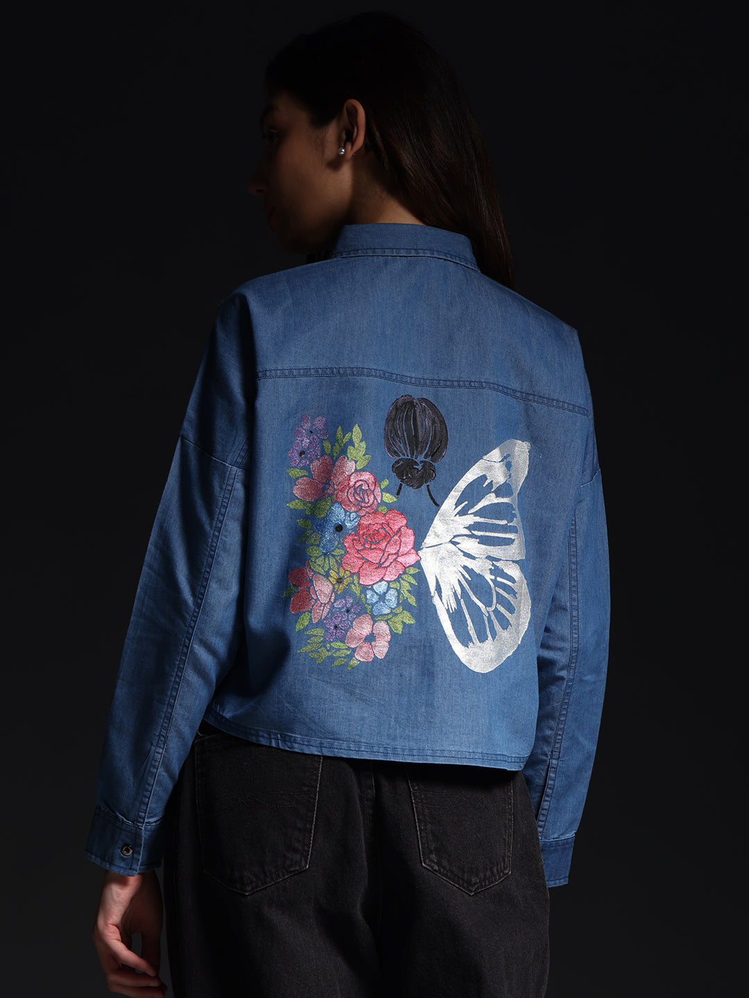 Gotamoda top jeans shirt with floral and butterfly print on the back, worn by model from behind
