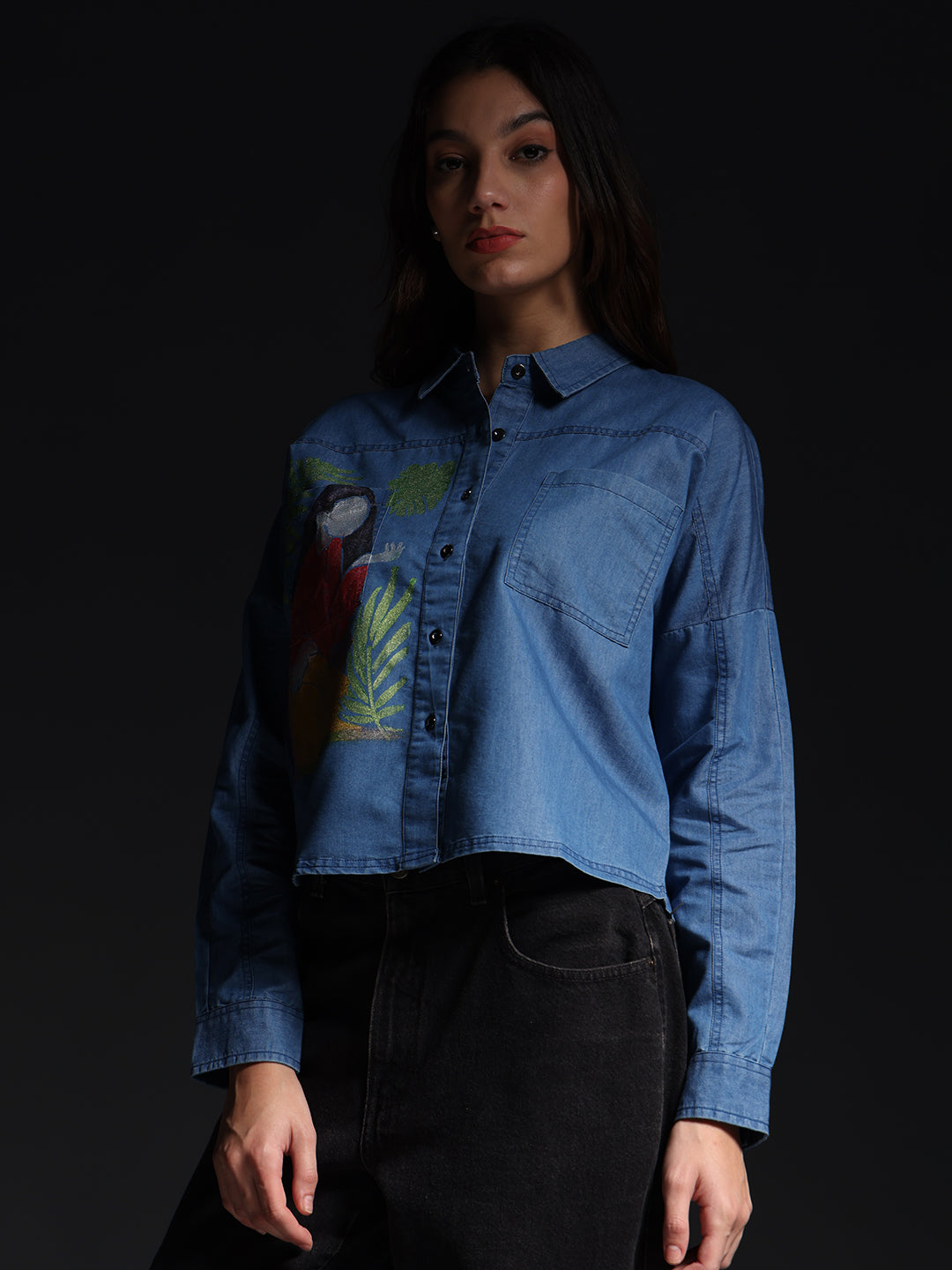 Gotamoda blue Top Jeans Shirt with front pocket and colorful abstract print worn by woman