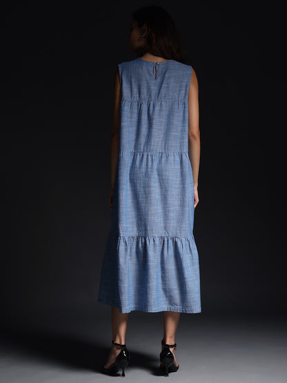 Gotamoda sleeveless maxi dress in blue checked pattern shown from the back with tiered design