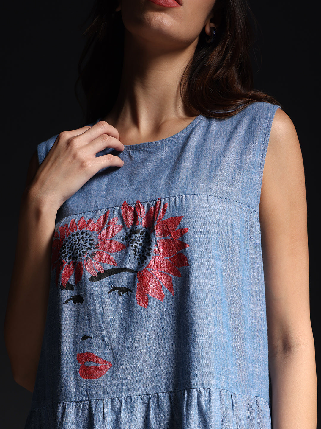 Gotamoda sleeveless maxi dress in blue with graphic floral face print and round neckline