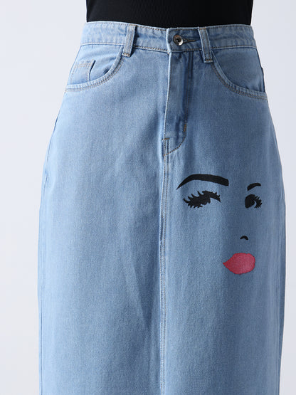 Gotamoda Winking Beauty Denim Hand Painted Denim Skirt with artistic facial design on light blue fabric