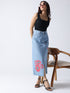Winking Beauty Denim Hand Painted Denim Skirt worn by model with black top and sandals